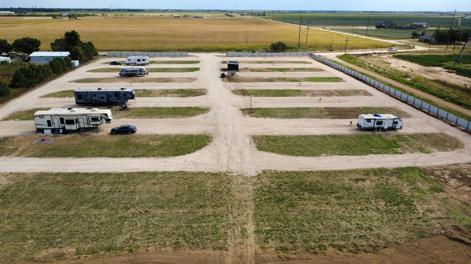 An aerial view of the spacious, level gravel RV sites at Hub City Hideaway.